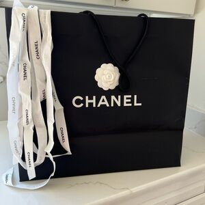 CHANEL Black Shopping Bag with White Camellia Flower Detail and fabric ribbon
